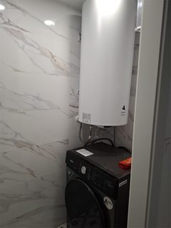 Lavadero con termo instalado en Barcelona