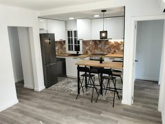 Reforma integral en Barcelona: cocina y suelo renovados